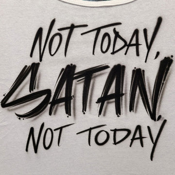 White tank top with black airbrush graffiti-style lettering that reads “Not Today, Satan, Not Today” in bold, hand-painted script.