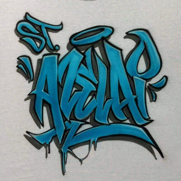 Front view of a custom graffiti shirt with wildstyle blue lettering, outlined in black, and a halo graphic above the name, designed in a bold and expressive street art style.